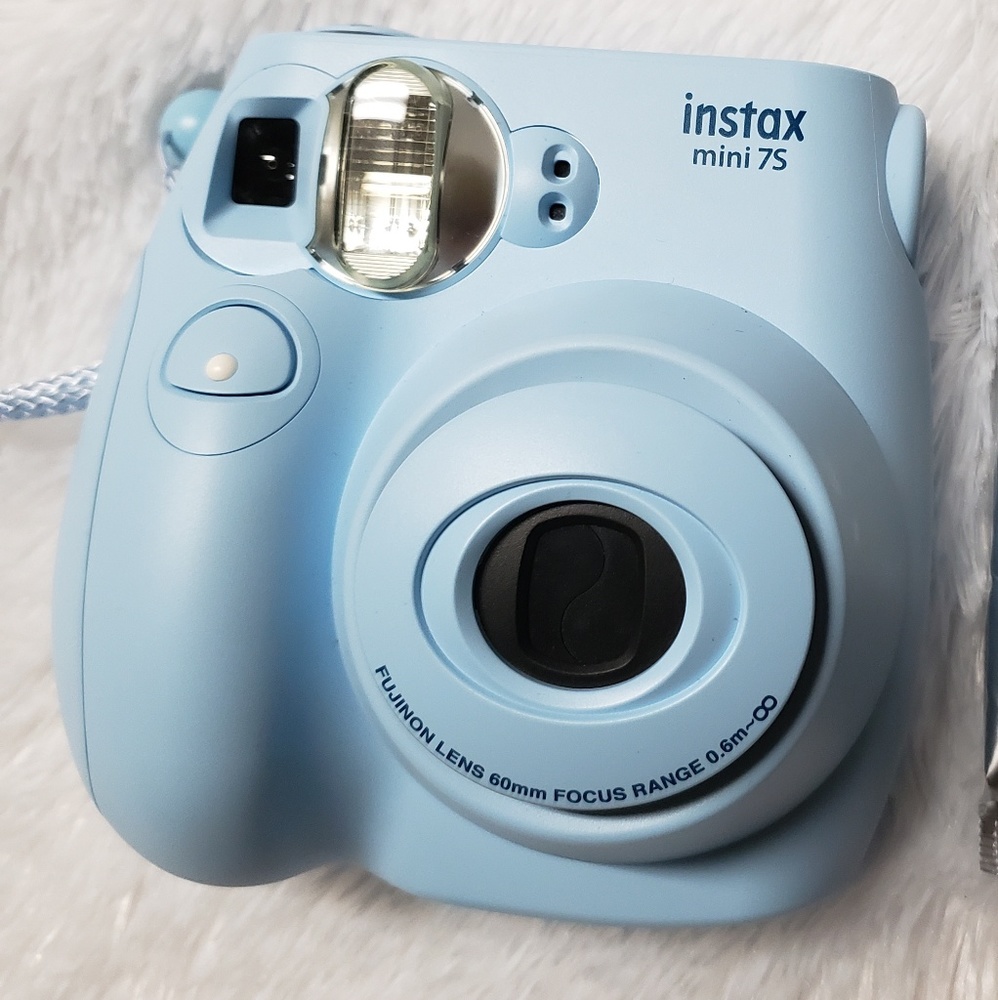 Instax mini 7s with extra film:)